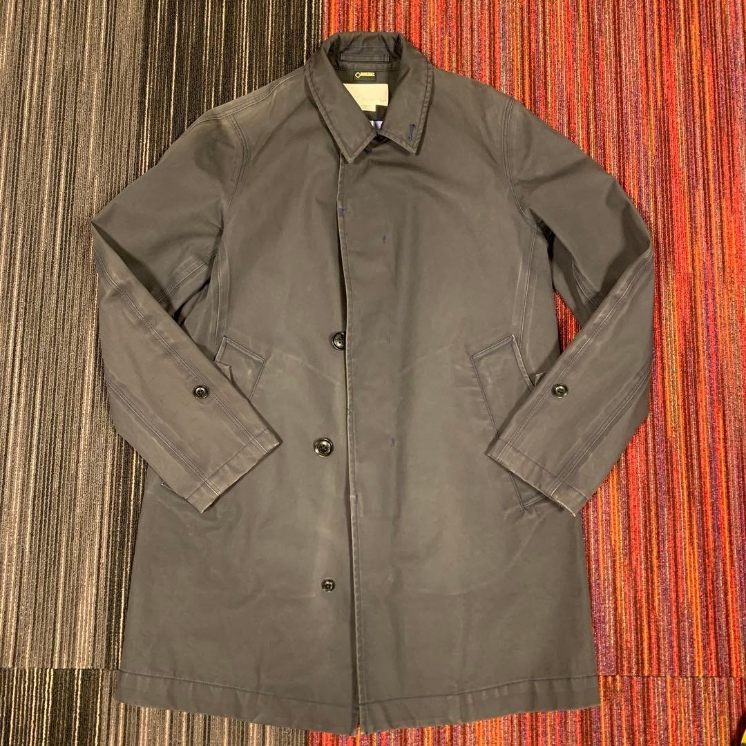 Illustrative sample photo of a Nanamica navy coat